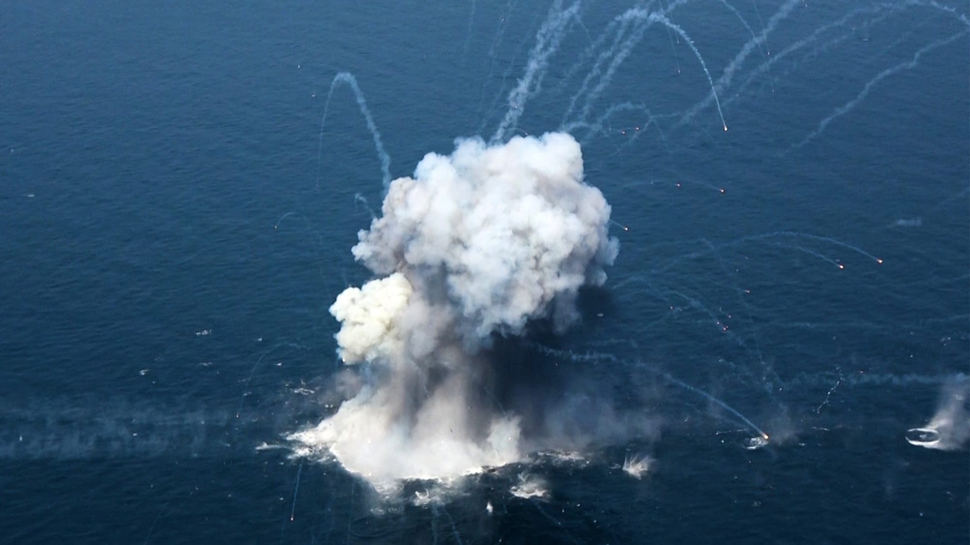 Cargo Vessels Hit as Iran Threatens to Close Gulf Oil Chokepoint